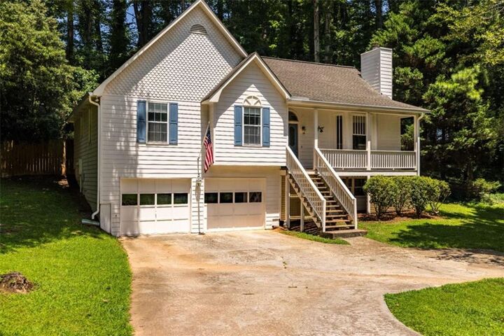 Property Photo:  606 Rose Creek Cove  GA 30189 