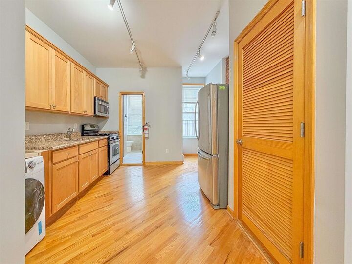 Property Photo: 402 Grand St 401 NJ 07030