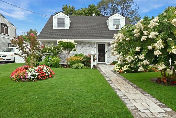 Property Photo: 913 Merillon Avenue NY 11590