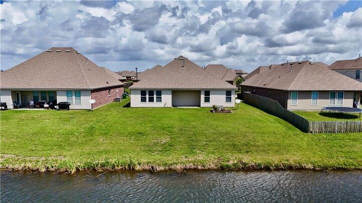 Property Photo:  440 W Lake Drive  LA 70461 