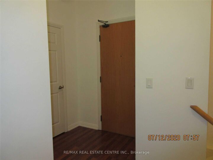 Property Photo: 220 Forum Drive Th#111 ON L4Z 4K1