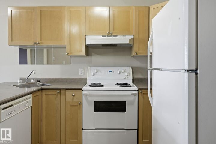 Property Photo:  11008 124 Street NW 15  AB T5M 0J4 