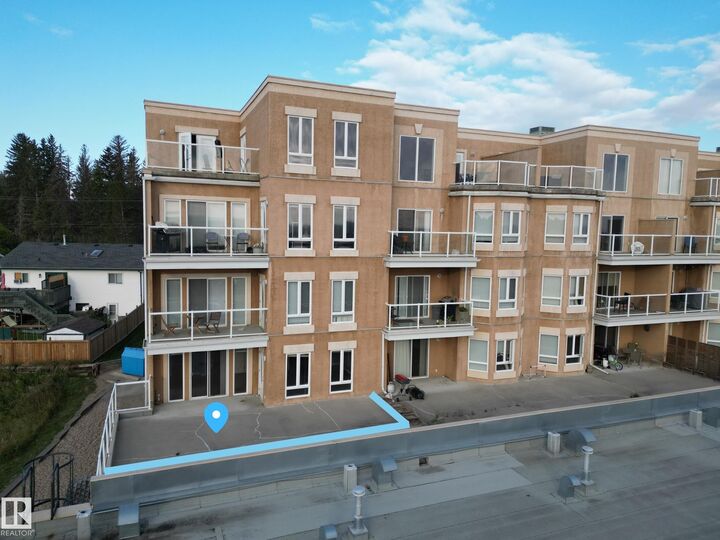 Property Photo: 802 12 Street 209 AB T9M 0A7