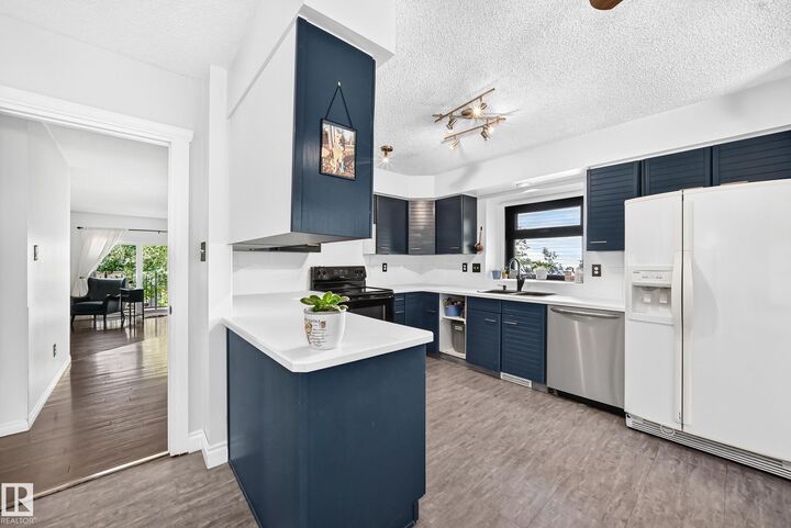 Property Photo:  29 Windermere Crescent  AB T8N 3P1 