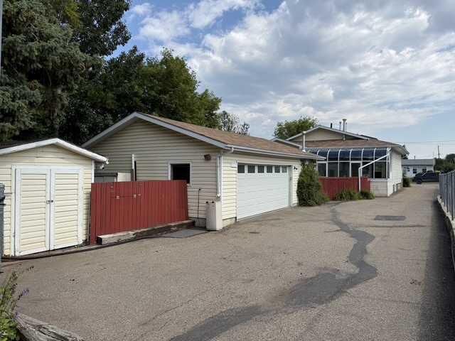 Property Photo: 4732 48 Street AB T4S 1M9