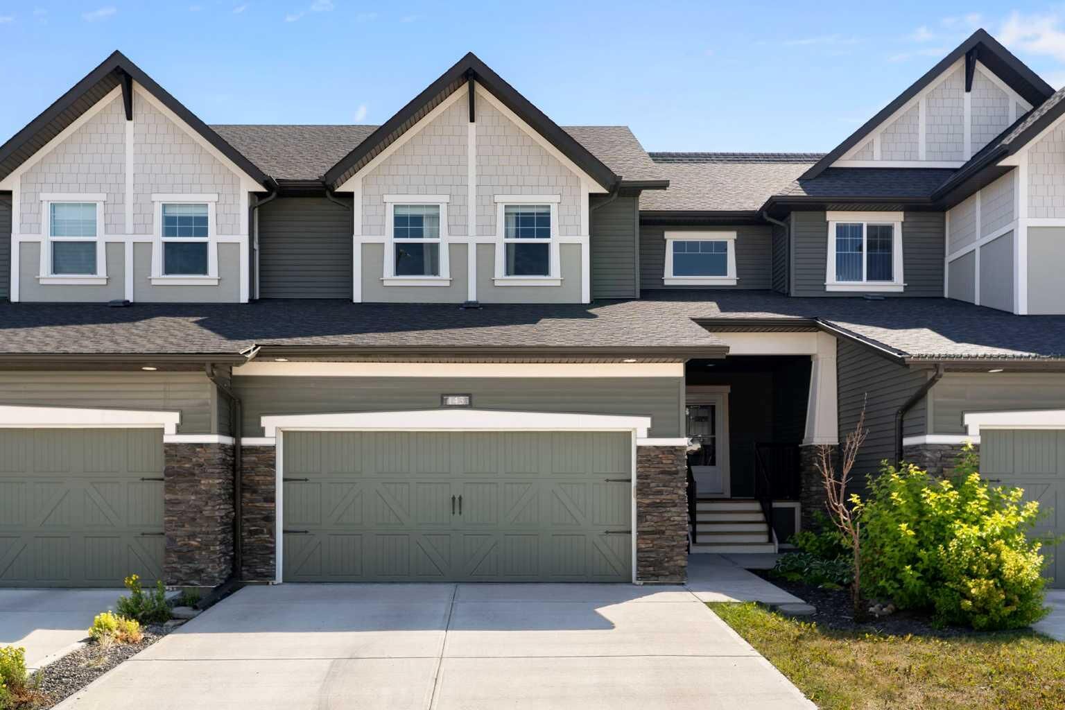 Property Photo:  143 Cooperswood Place SW  AB T4B 3Y7 