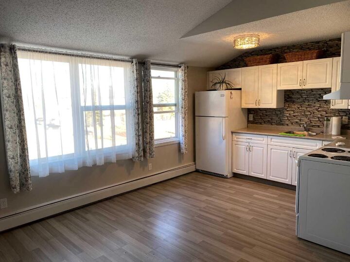 Property Photo: 7201 Poplar Drive 2204 AB T8V 6C5