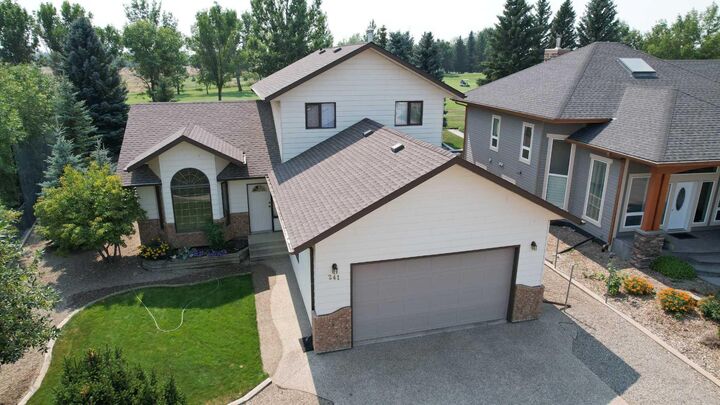 Property Photo: 241 Fairway Drive AB T1M 1M9