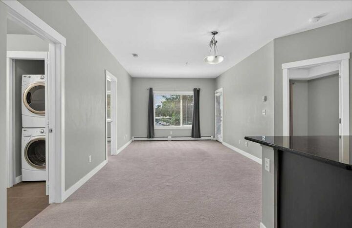 Property Photo:  3950 46 Avenue NW 210  AB T3A 0L9 