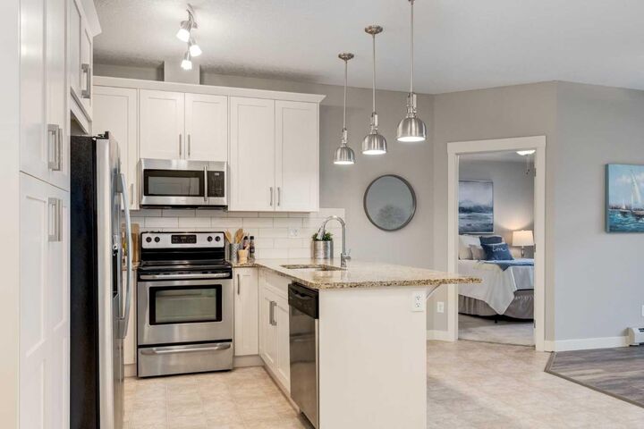 Property Photo:  522 Cranford Drive SE 3109  AB T3M 2L7 