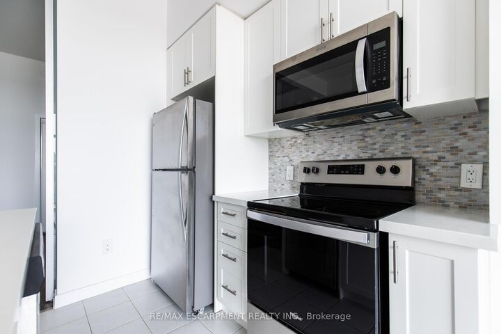 Property Photo: 450 Dundas Street E 416 ON L8B 1Z2