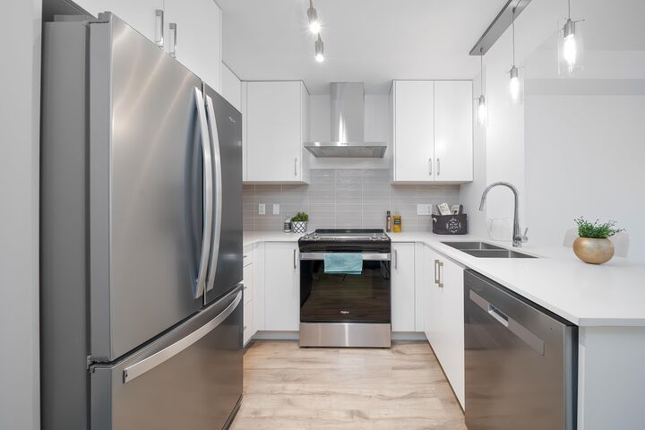 Property Photo: 6338 King George Boulevard 116 BC V3X 0L4