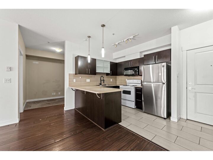 Property Photo:  33545 Rainbow Avenue 111  BC V2S 1Z6 