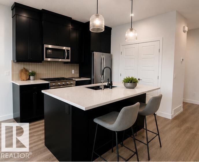Property Photo: 5311 Hawthorn Close SW AB T6X 3N5