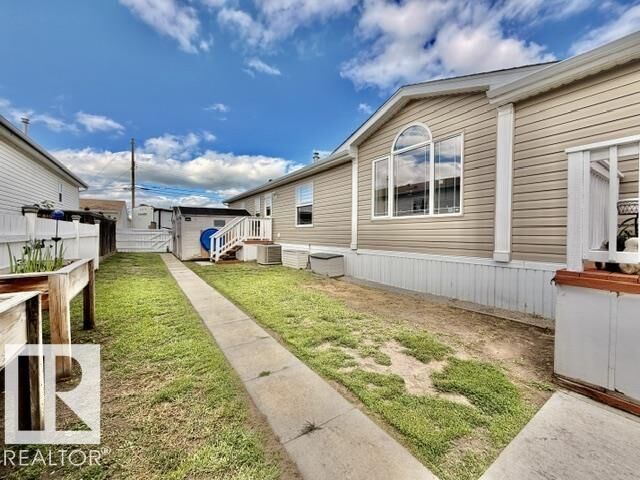 Property Photo: 4814 48 Avenue AB T9A 0E7
