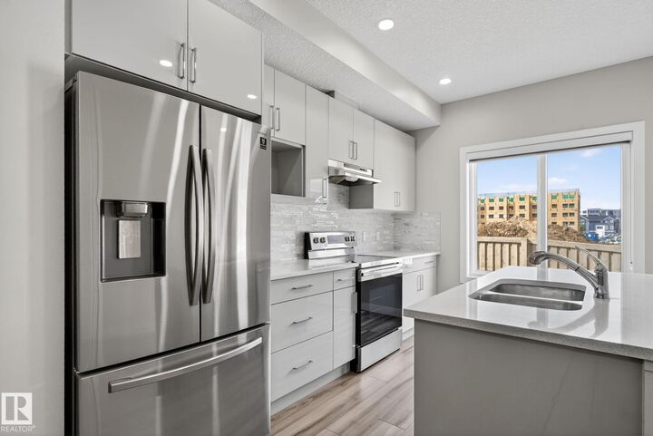 Property Photo: 4879 Alwood Point(E) SW AB T6W 4N1
