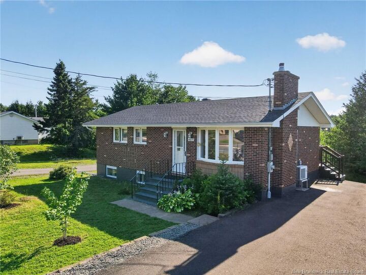 Property Photo: 407 Fox Creek Road NB E1A 7M5