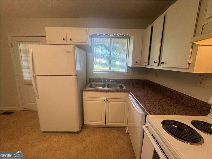 Property Photo:  8497 Stonewall Jackson Drive  GA 30238 