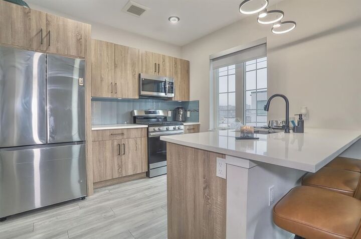 Property Photo:  212 70th St 201  NJ 07093 