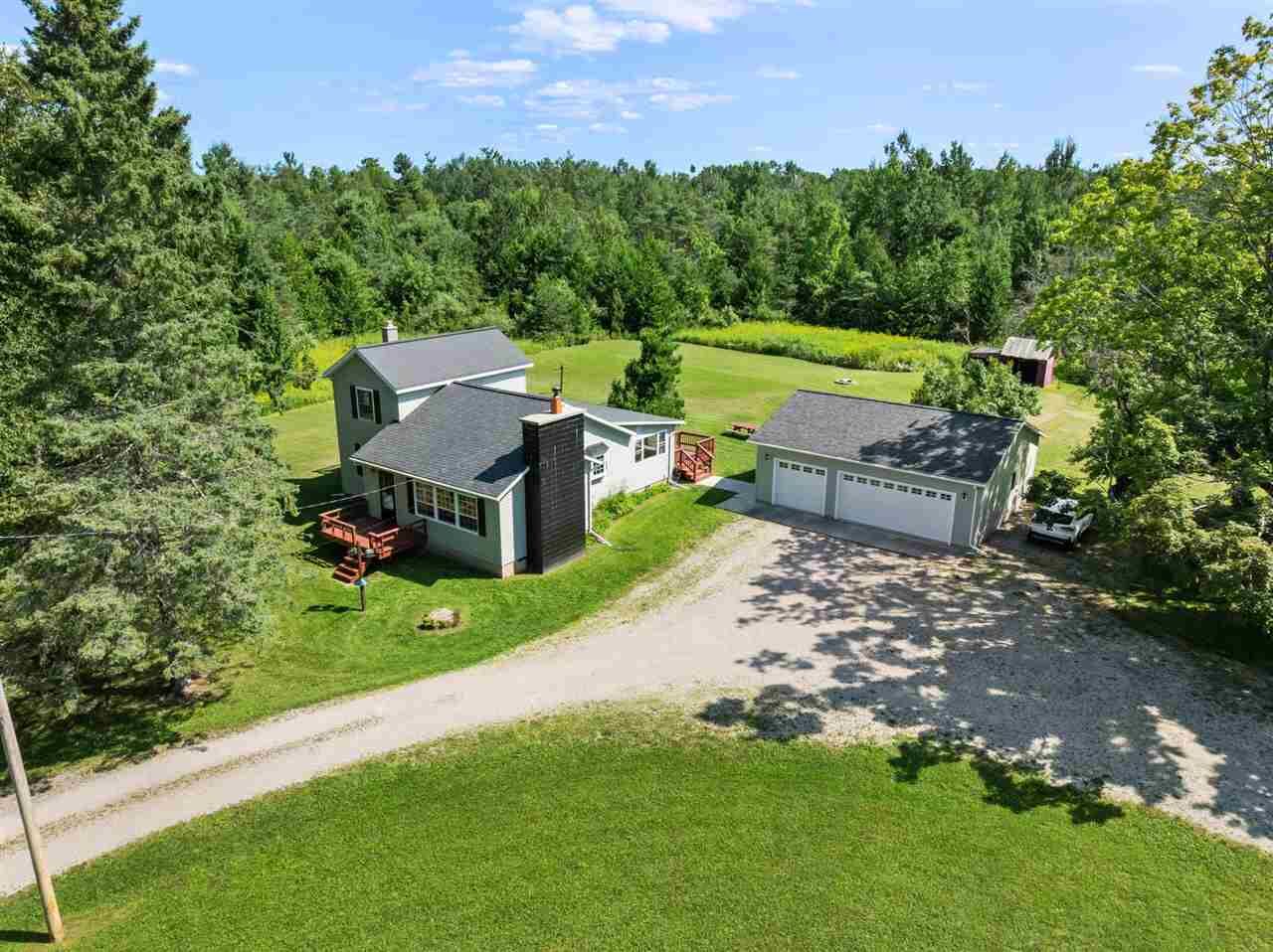 Property Photo:  9651 South River  MI 49720 