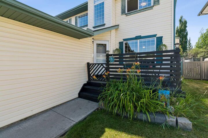 Property Photo: 10433 Hidden Valley Drive NW AB T3A 5M2