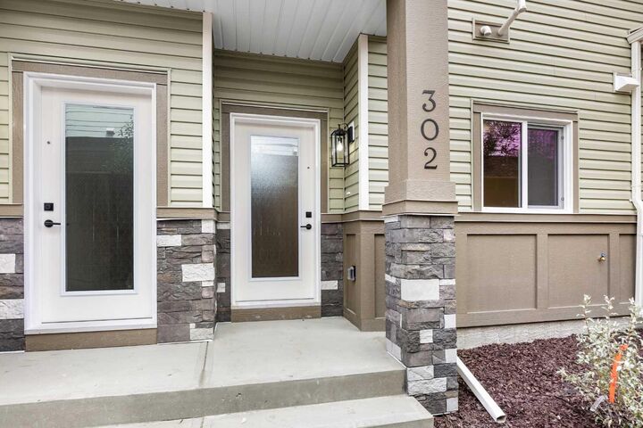 Property Photo: 67 Panatella Square NW 302 AB T3K 2S7