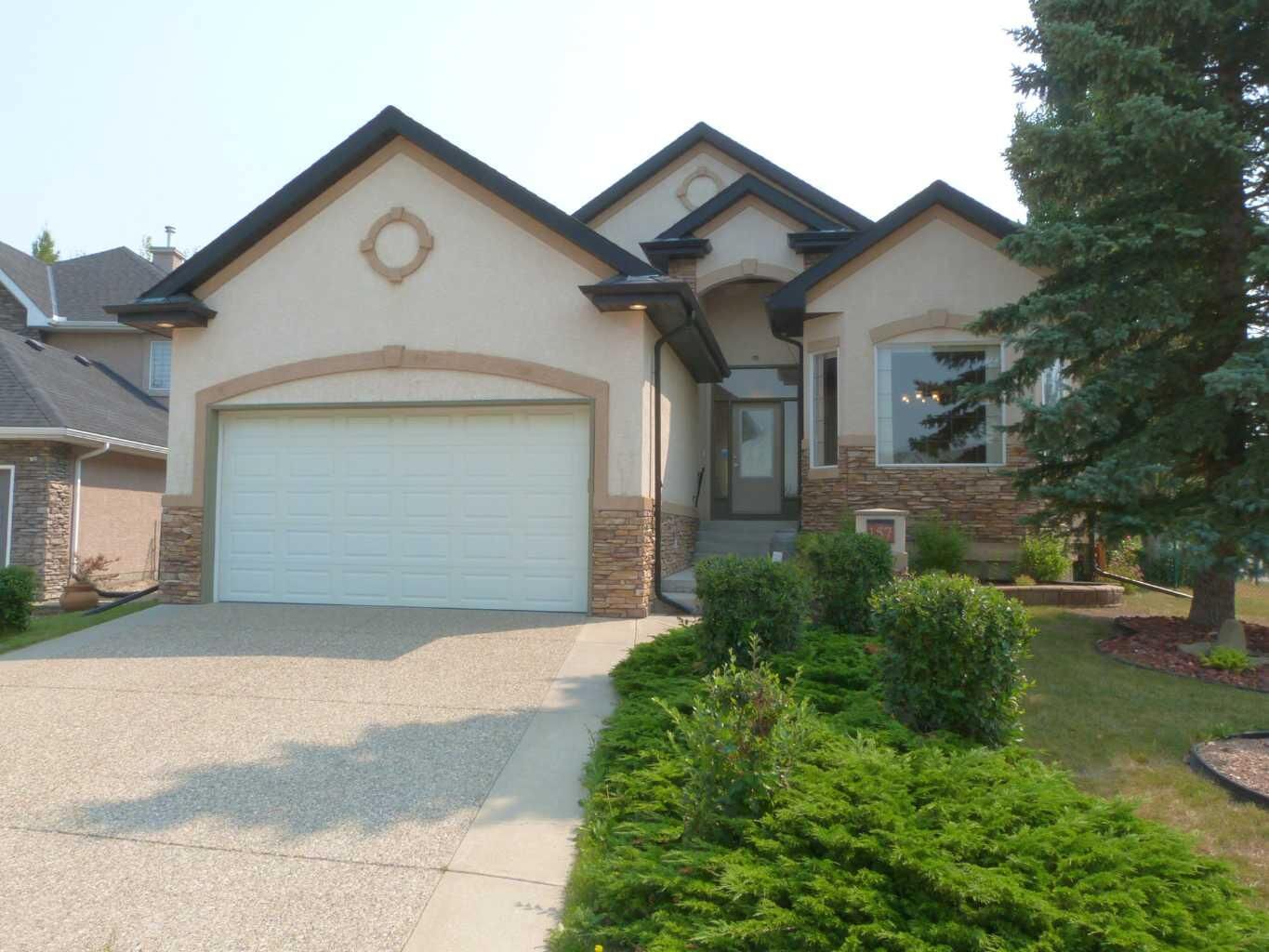 Property Photo: 157 Valley Creek Place NW AB T3B 5V1