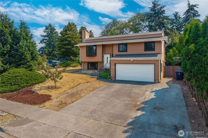 Property Photo:  1159 N Vassault Street  WA 98406 