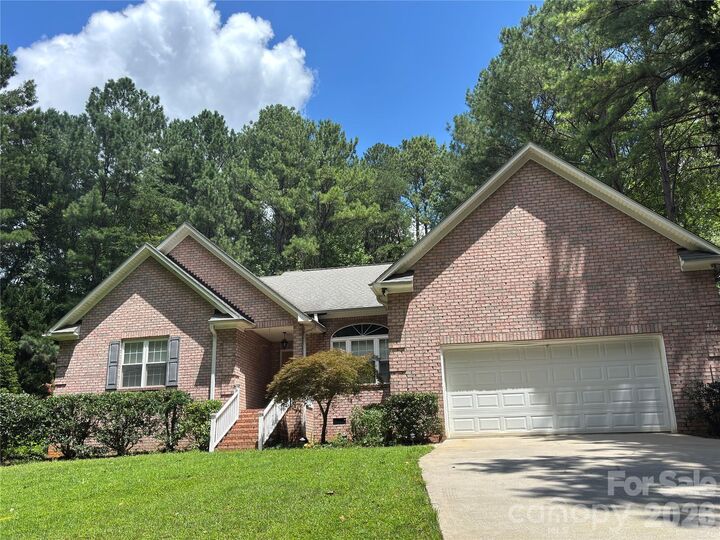 Property Photo:  7097 Windy Pine Circle  NC 28037 