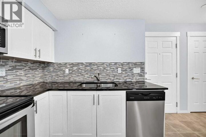 Property Photo:  755 Copperpond Boulevard Southeast  AB T2Z 4R2 
