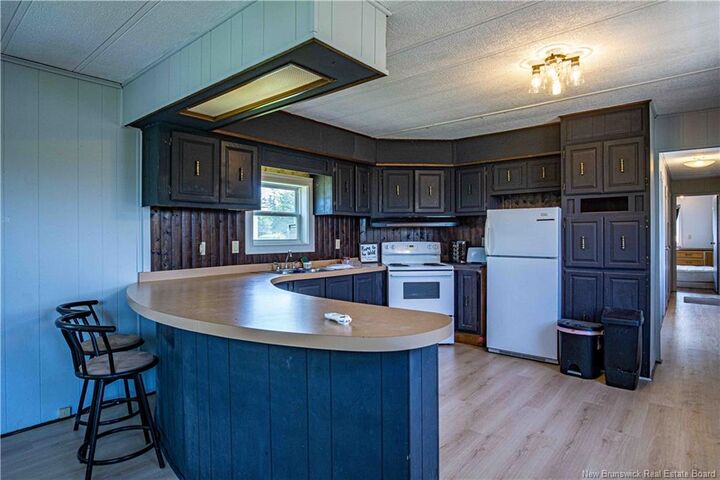 Property Photo:  423 Route 105  NB E3A 8N3 