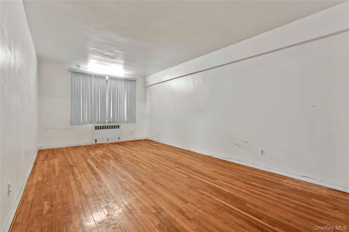 Property Photo: 28-08 141st Street 1A NY 11354