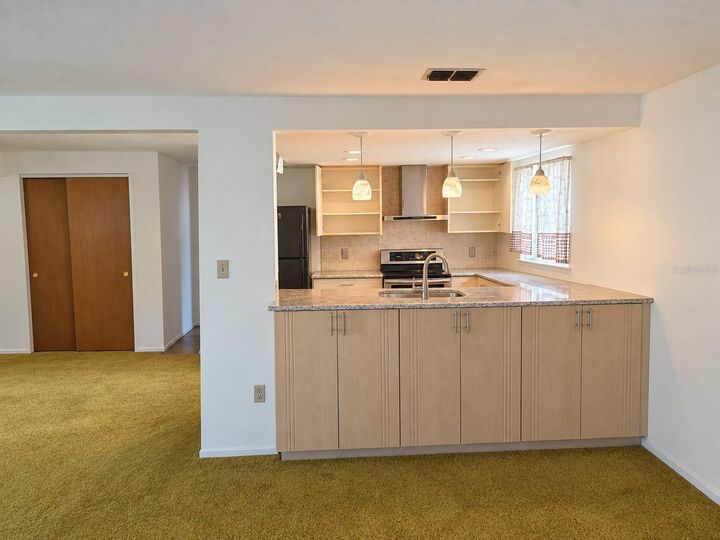Property Photo:  6123 Halifax Drive  FL 34653 