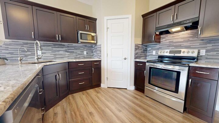 Property Photo: 6513 112 Street AB T8W 0J8