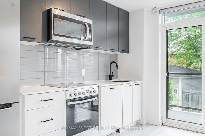 Property Photo: 2300 St Clair Avenue W 211 ON M6N 0B3