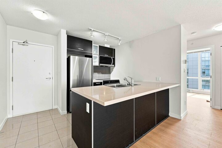 Property Photo: 13688 100 Avenue 3202 BC V3T 0G5