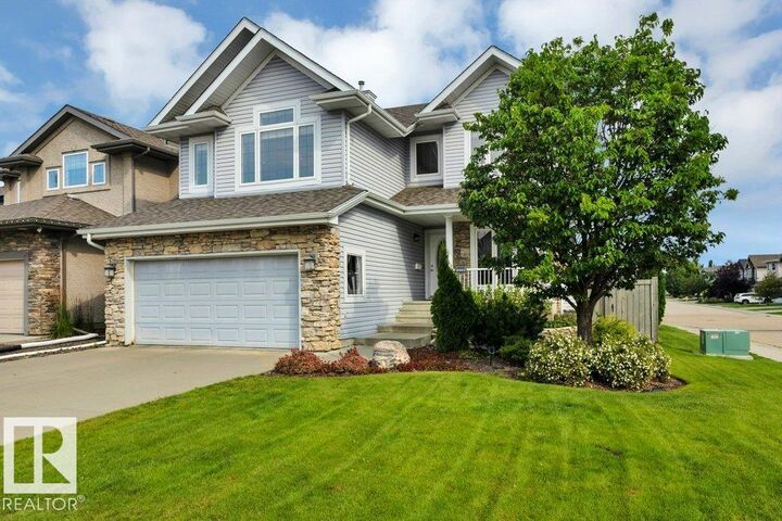 Property Photo:  6483 Sandin Crescent NW  AB T6R 0G1 