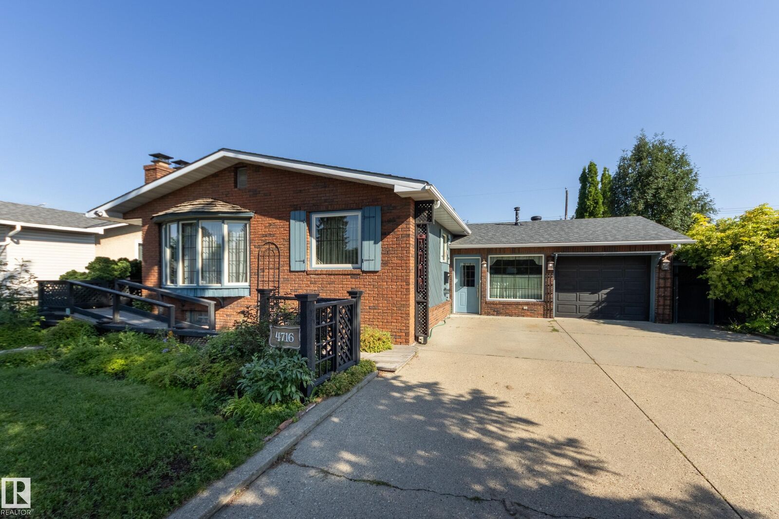 Property Photo:  4716 109 Avenue NW  AB T6A 1R6 
