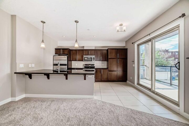 Property Photo: 488 7 Avenue NE 206 AB T2E 0N2
