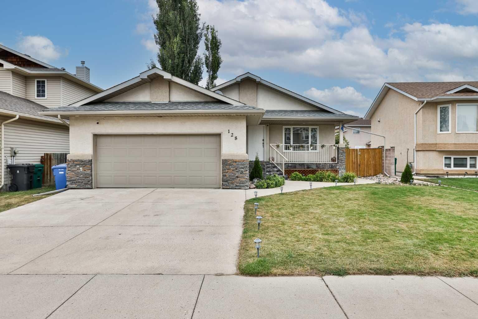 Property Photo:  128 Cougar Road N  AB T1H 6M7 