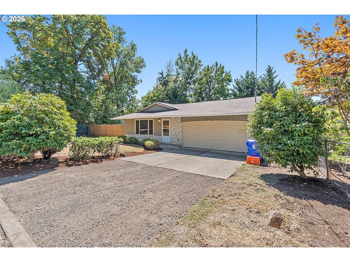 Property Photo:  15641 SE Hugh Ave  OR 97267 