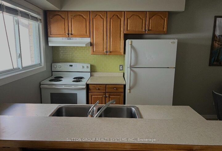 Property Photo: 211 Veronica Drive 19 ON N2A 2R8