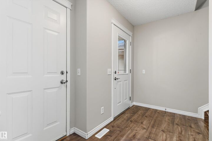Property Photo: 7847 7 Avenue SW AB T6X 1N3