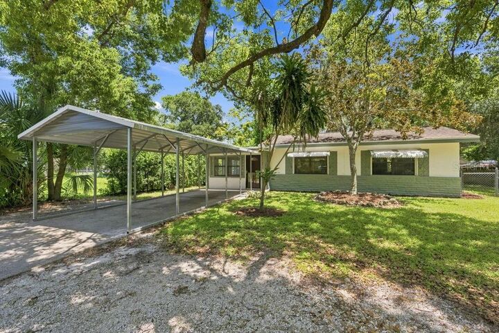 Property Photo: 7810 Chapel Avenue FL 34668