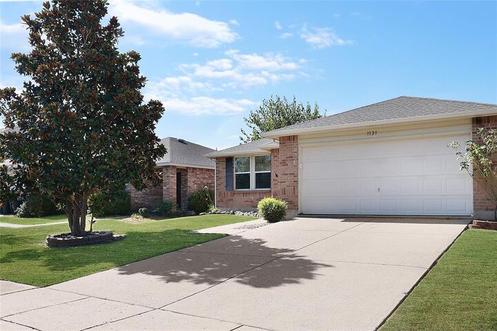 Property Photo:  1121 Batt Masterson Drive  TX 75409 