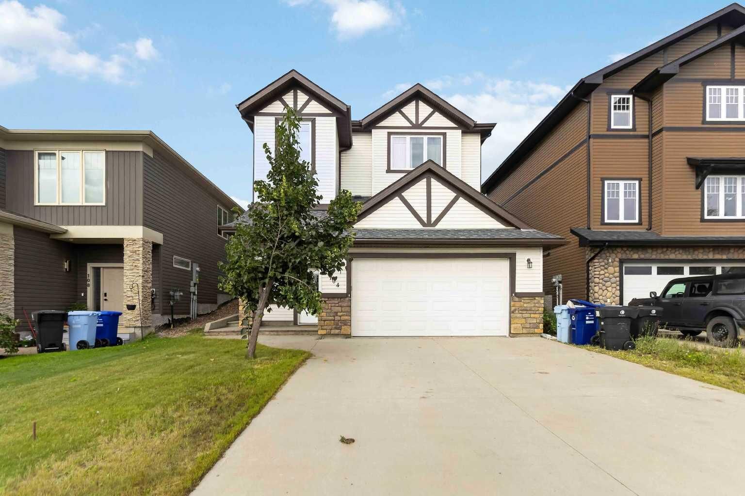 Property Photo: 104 Killdeer Way AB T9K 0P8