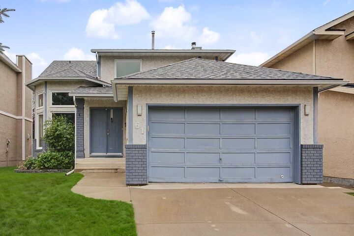 Property Photo: 61 Wood Valley Road SW AB T2W 5Y6