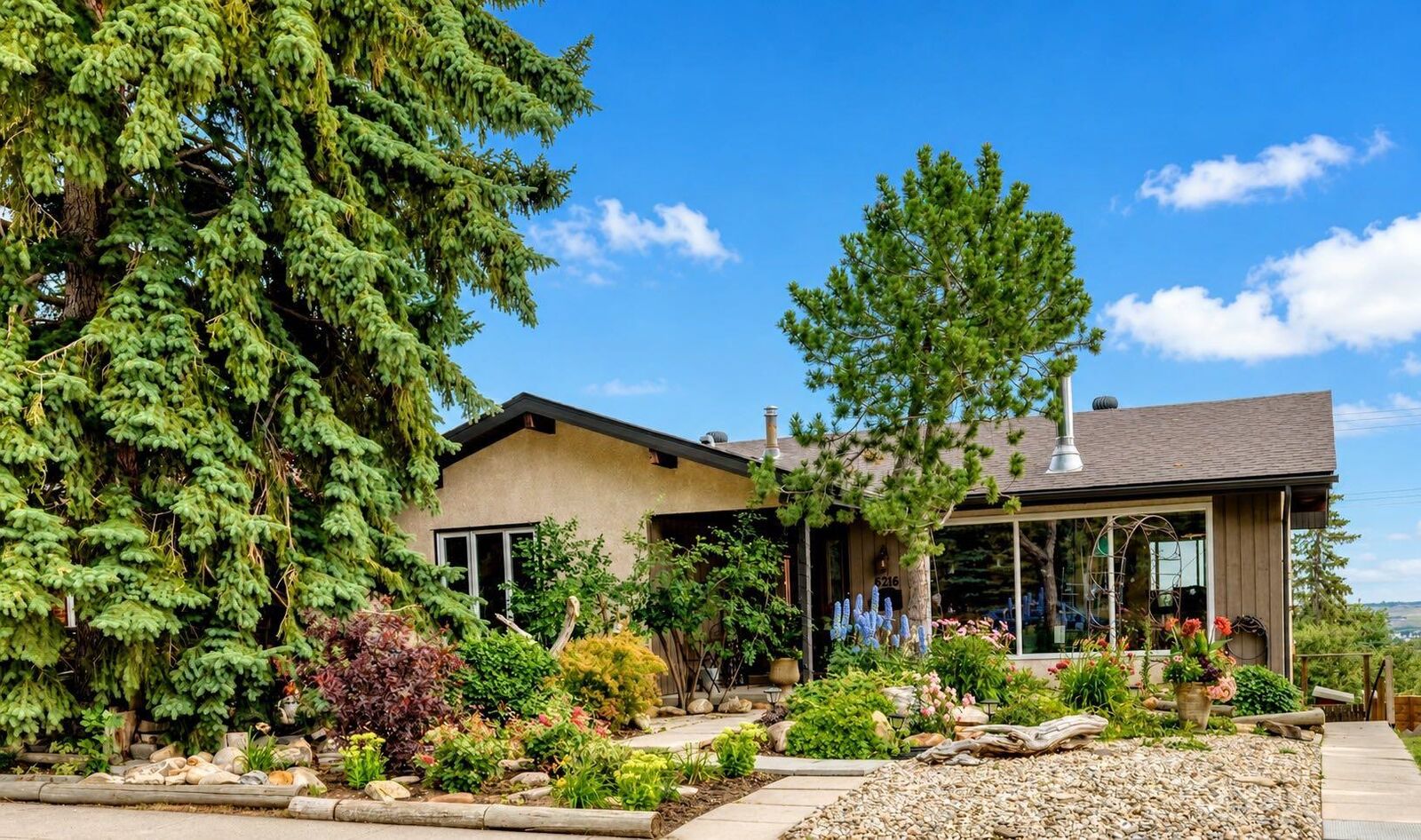 Property Photo: 6216 Touchwood Drive NW AB T2K 3L9