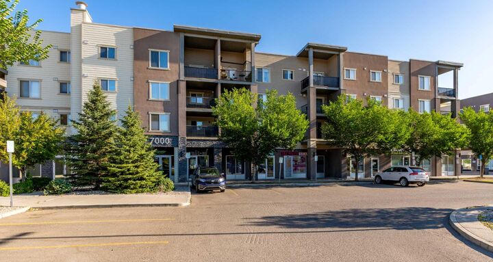 Property Photo:  403 Mackenzie Way SW 7202  AB T4B 3V7 