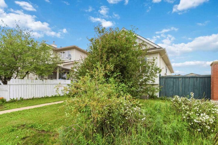 Property Photo: 102 Dominion Drive AB T9K 2N2